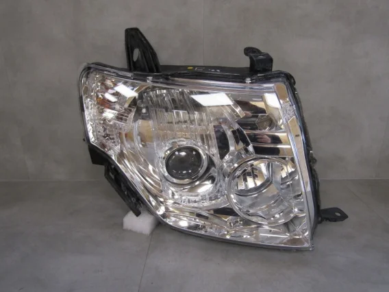 Ekspresowa dostawa LAMPA PRZÓD MITSUBISHI PAJERO IV 4 06- KSENON NIESKRĘTNY RH PRAWA